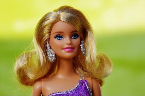 A Barbie. The French for "a Barbie" is "une Barbie".