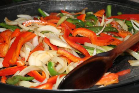 To stir fry. The Thai for "to stir fry" is "ผัด".