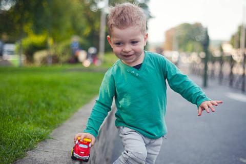 He is playing with his toy car!. The Chinese for "He is playing with his toy car!" is "他正在玩这辆玩具车!". He is playing with his toy car!. The Chinese for "He is playing with his toy car!" is "他正在玩这辆玩具车!".