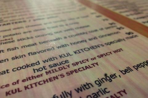 A card; a menu. The French for "a card; a menu" is "une carte".