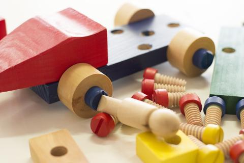 A wooden toy. The French for "a wooden toy" is "un jouet en bois".