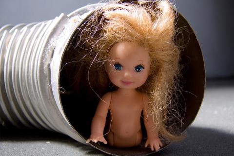 Doll. The French for "doll" is "poupée".