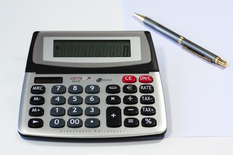 A calculator and a pen. The Thai for "a calculator and a pen" is "เครื่องคิดเลขและปากกา". A calculator and a pen. The Thai for "a calculator and a pen" is "เครื่องคิดเลขและปากกา".