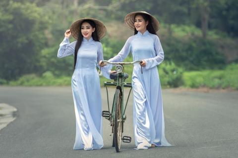 Two women and a bicycle. The Thai for "two women and a bicycle" is "ผู้หญิงสองคนและจักรยาน". Two women and a bicycle. The Thai for "two women and a bicycle" is "ผู้หญิงสองคนและจักรยาน".