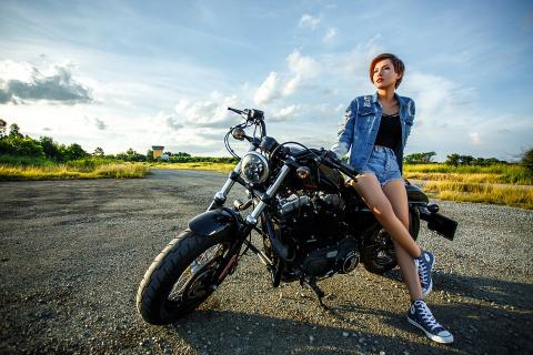 A woman and a motorbike. The Thai for "a woman and a motorbike" is "ผู้หญิงและมอร์เตอร์ไซค์". A woman and a motorbike. The Thai for "a woman and a motorbike" is "ผู้หญิงและมอร์เตอร์ไซค์".