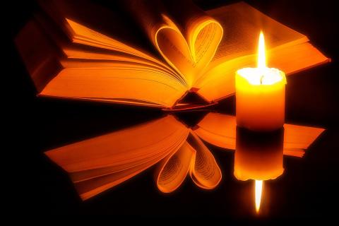 A candle and a book. The Thai for "a candle and a book" is "เทียนและหนังสือ". A candle and a book. The Thai for "a candle and a book" is "เทียนและหนังสือ".