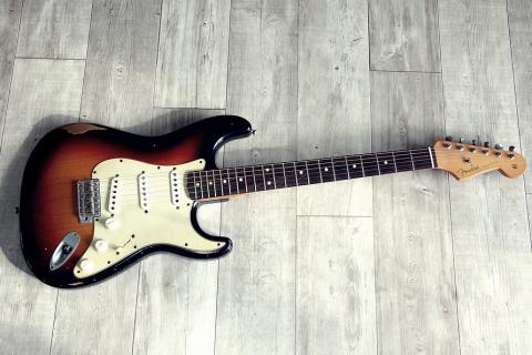 An electric guitar. The Thai for "an electric guitar" is "กีตาร์ไฟฟ้า". An electric guitar. The Thai for "an electric guitar" is "กีตาร์ไฟฟ้า".