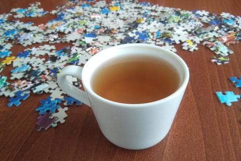 A cup of tea and a jigsaw puzzle. The Thai for "a cup of tea and a jigsaw puzzle" is "ชาหนึ่งถ้วยและจิ๊กซอว์". A cup of tea and a jigsaw puzzle. The Thai for "a cup of tea and a jigsaw puzzle" is "ชาหนึ่งถ้วยและจิ๊กซอว์".