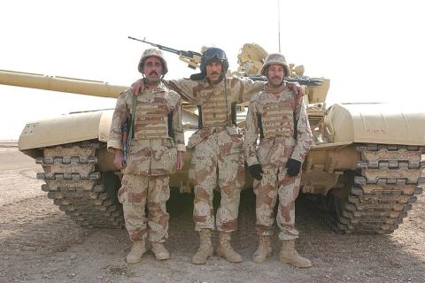 A tank and three soldiers. The Thai for "a tank and three soldiers" is "รถถังและทหารสามนาย". A tank and three soldiers. The Thai for "a tank and three soldiers" is "รถถังและทหารสามนาย".