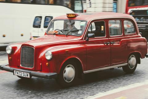 A red taxi. The Thai for "a red taxi" is "แท็กซี่สีแดง". A red taxi. The Thai for "a red taxi" is "แท็กซี่สีแดง".