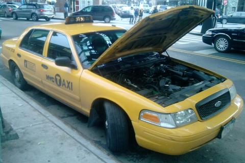 A broken down yellow taxi. The Thai for "a broken down yellow taxi" is "แท็กซี่สีเหลืองเสีย". A broken down yellow taxi. The Thai for "a broken down yellow taxi" is "แท็กซี่สีเหลืองเสีย".