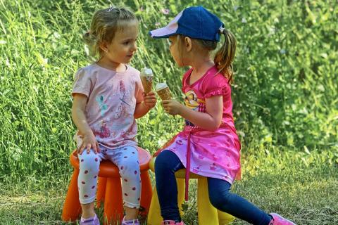 Two girls with ice creams. The Thai for "two girls with ice creams" is "เด็กหญิงสองคนและไอศกรีม". Two girls with ice creams. The Thai for "two girls with ice creams" is "เด็กหญิงสองคนและไอศกรีม".