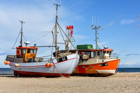 Two fishing boats. The Thai for "two fishing boats" is "เรือประมงสองลำ". Two fishing boats. The Thai for "two fishing boats" is "เรือประมงสองลำ".