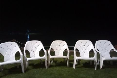 Five white plastic chairs. The Thai for "five white plastic chairs" is "เก้าอี้พลาสติกสีขาวห้าตัว". Five white plastic chairs. The Thai for "five white plastic chairs" is "เก้าอี้พลาสติกสีขาวห้าตัว".
