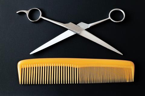 A pair of scissors with a comb. The Thai for "a pair of scissors with a comb" is "กรรไกรกับหวี". A pair of scissors with a comb. The Thai for "a pair of scissors with a comb" is "กรรไกรกับหวี".