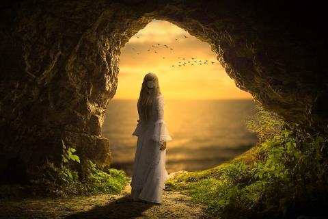A woman in a white dress in a cave. The Thai for "a woman in a white dress in a cave" is "ผู้หญิงชุดขาวในถ้ำ". A woman in a white dress in a cave. The Thai for "a woman in a white dress in a cave" is "ผู้หญิงชุดขาวในถ้ำ".