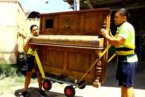 Two men are moving a piano. The Thai for "two men are moving a piano" is "ชายสองคนกำลังย้ายเปียโน". Two men are moving a piano. The Thai for "two men are moving a piano" is "ชายสองคนกำลังย้ายเปียโน".