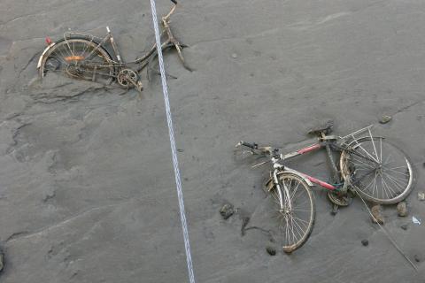 Two bicycles in the mud. The Thai for "two bicycles in the mud" is "จักรยานสองคันอยู่ในโคลน". Two bicycles in the mud. The Thai for "two bicycles in the mud" is "จักรยานสองคันอยู่ในโคลน".