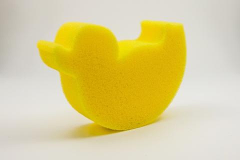 A duck shaped sponge. The Thai for "a duck shaped sponge" is "ฟองน้ำรูปเป็ด". A duck shaped sponge. The Thai for "a duck shaped sponge" is "ฟองน้ำรูปเป็ด".