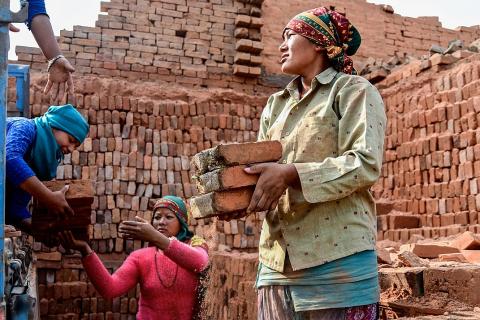 Female workers and a pile of bricks. The Thai for "female workers and a pile of bricks" is "คนงานหญิงและกองอิฐ". Female workers and a pile of bricks. The Thai for "female workers and a pile of bricks" is "คนงานหญิงและกองอิฐ".