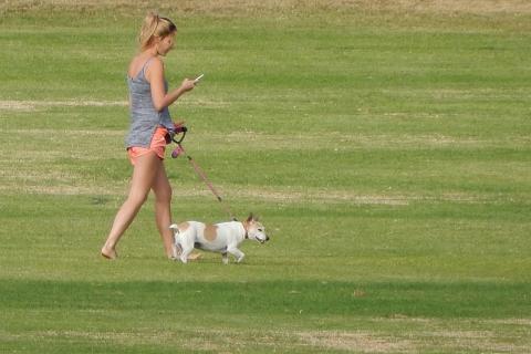 A barefoot woman with her dog. The Thai for "a barefoot woman with her dog" is "ผู้หญิงเท้าเปล่ากับสุนัขของเธอ". A barefoot woman with her dog. The Thai for "a barefoot woman with her dog" is "ผู้หญิงเท้าเปล่ากับสุนัขของเธอ".