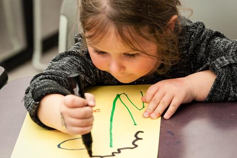 A girl drawing. The Thai for "a girl drawing" is "เด็กผู้หญิงวาดรูป". A girl drawing. The Thai for "a girl drawing" is "เด็กผู้หญิงวาดรูป".