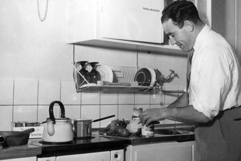 A man cooking in the kitchen. The Thai for "a man cooking in the kitchen" is "ผู้ชายทำอาหารในห้องครัว". A man cooking in the kitchen. The Thai for "a man cooking in the kitchen" is "ผู้ชายทำอาหารในห้องครัว".