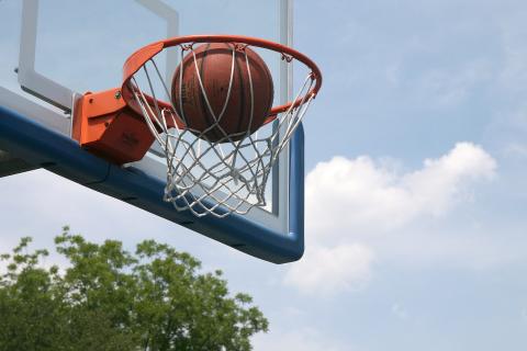 A basketball in a basketball hoop. The Thai for "a basketball in a basketball hoop" is "ลูกบาสเกตบอลในห่วงบาสเกตบอล". A basketball in a basketball hoop. The Thai for "a basketball in a basketball hoop" is "ลูกบาสเกตบอลในห่วงบาสเกตบอล".