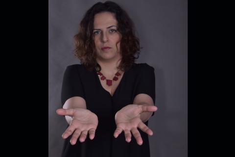 A woman opens her two palms. The Thai for "a woman opens her two palms" is "ผู้หญิงแบมือสองข้าง". A woman opens her two palms. The Thai for "a woman opens her two palms" is "ผู้หญิงแบมือสองข้าง".