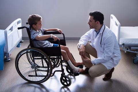 A doctor and a pediatric patient in a wheelchair. The Thai for "a doctor and a pediatric patient in a wheelchair" is "หมอและผู้ป่วยเด็กในวีลแชร์". A doctor and a pediatric patient in a wheelchair. The Thai for "a doctor and a pediatric patient in a wheelchair" is "หมอและผู้ป่วยเด็กในวีลแชร์".