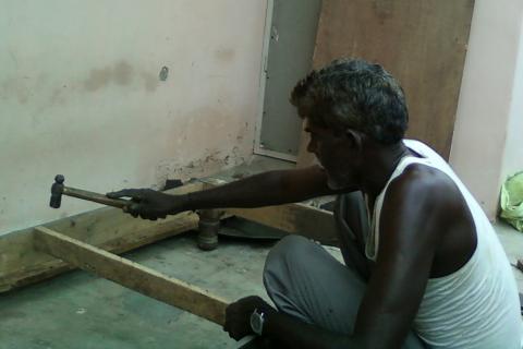 A carpenter working. The Thai for "a carpenter working" is "ช่างไม้กำลังทำงาน". A carpenter working. The Thai for "a carpenter working" is "ช่างไม้กำลังทำงาน".