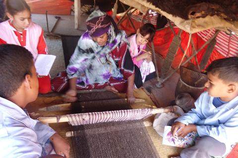 Children learning weaving. The Thai for "children learning weaving" is "เด็กๆเรียนรู้การทอผ้า". Children learning weaving. The Thai for "children learning weaving" is "เด็กๆเรียนรู้การทอผ้า".