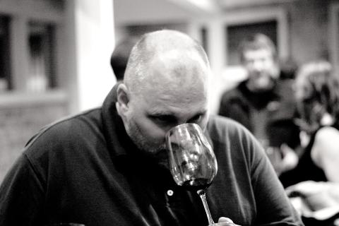 A man smelling some wine. The Thai for "a man smelling some wine" is "ผู้ชายดมกลิ่นไวน์". A man smelling some wine. The Thai for "a man smelling some wine" is "ผู้ชายดมกลิ่นไวน์".