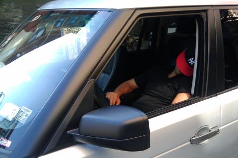 A man sleeping in a car. The Thai for "a man sleeping in a car" is "ผู้ชายนอนหลับในรถยนต์". A man sleeping in a car. The Thai for "a man sleeping in a car" is "ผู้ชายนอนหลับในรถยนต์".