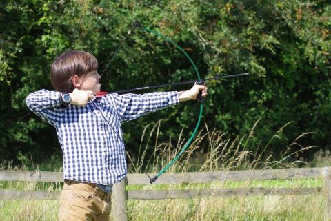 A boy shooting an arrow. The Thai for "a boy shooting an arrow" is "เด็กผู้ชายกำลังยิงธนู". A boy shooting an arrow. The Thai for "a boy shooting an arrow" is "เด็กผู้ชายกำลังยิงธนู".