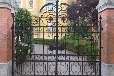 A wrought iron gate. The Thai for "a wrought iron gate" is "ประตูเหล็กดัด". A wrought iron gate. The Thai for "a wrought iron gate" is "ประตูเหล็กดัด".