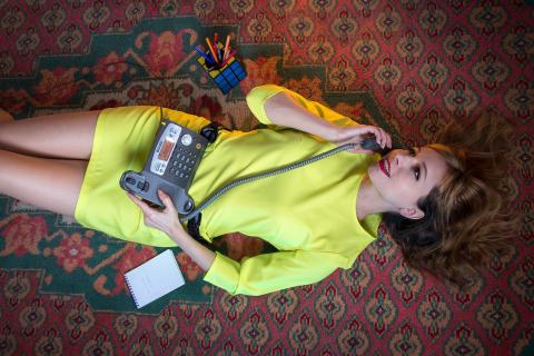 A woman lying on the carpet talking on the telephone. The Thai for "a woman lying on the carpet talking on the telephone" is "ผู้หญิงนอนคุยโทรศัพท์บนพรม". A woman lying on the carpet talking on the telephone. The Thai for "a woman lying on the carpet talking on the telephone" is "ผู้หญิงนอนคุยโทรศัพท์บนพรม".